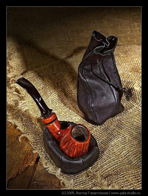 Still life with tobacco-pipe and tobacco pouch